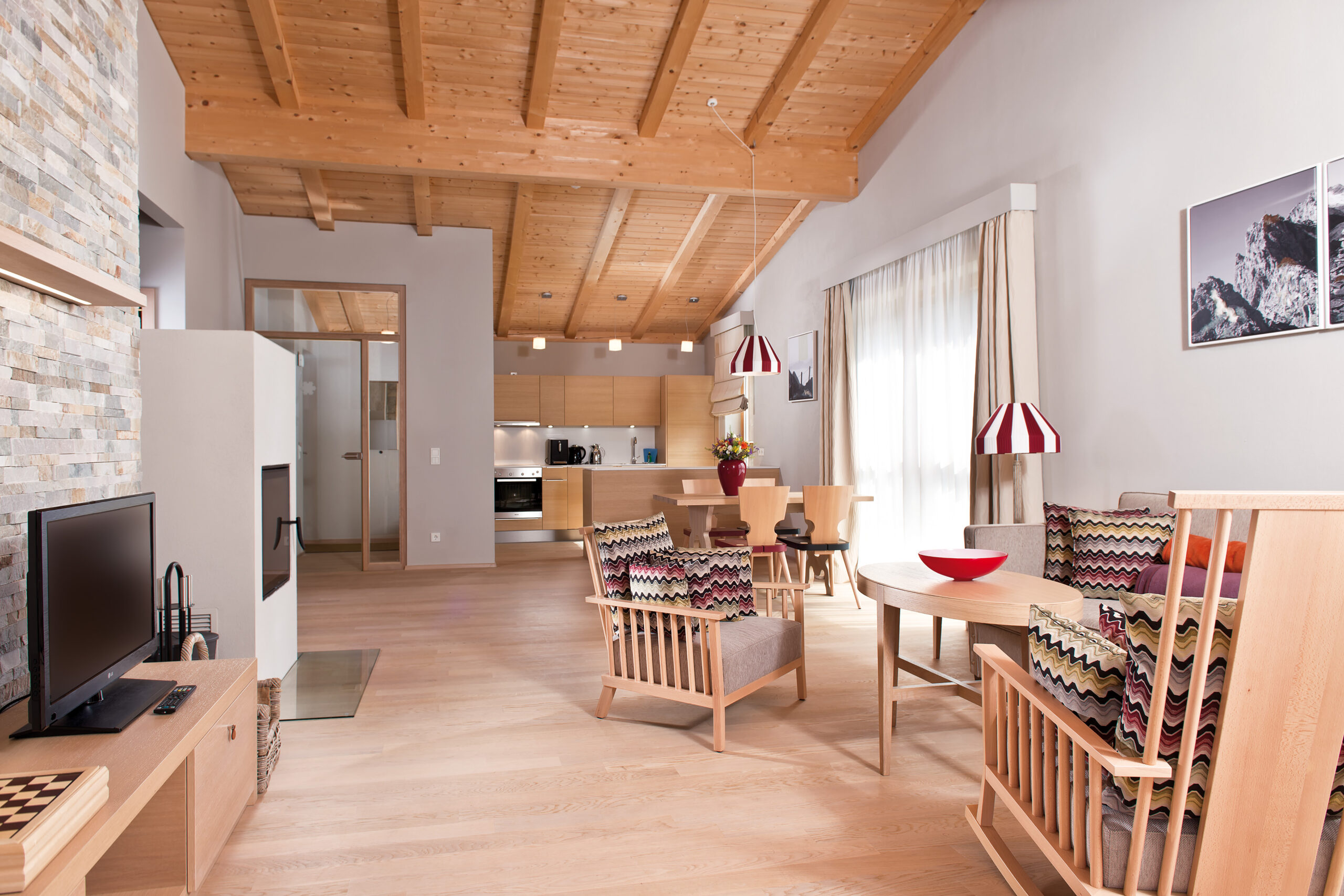 ferienwohnungen-wohnzimmer-sitzecke-bergresort-werfenweng
